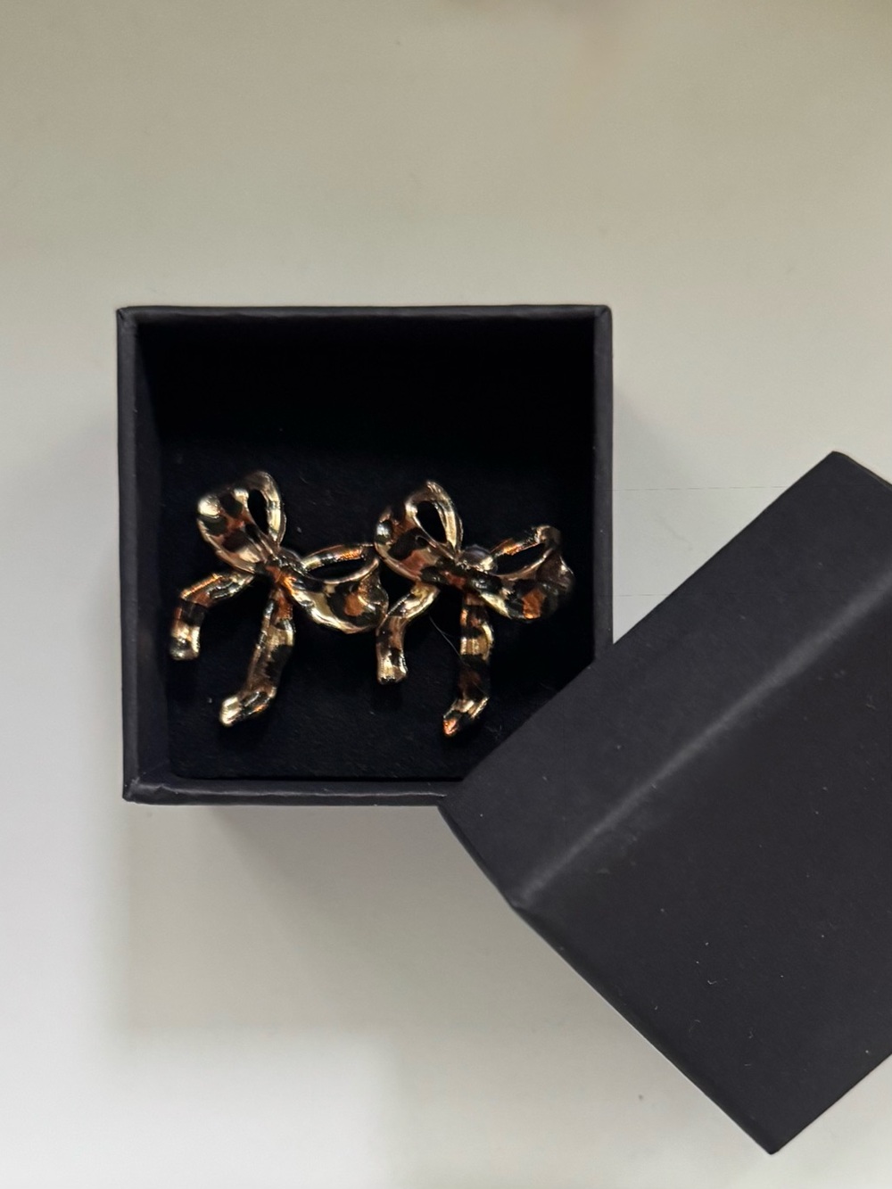 Super cute 🎀 Leopard Print Bow Stud Earrings - Gold and Black earring pair - Picture 4 of 5